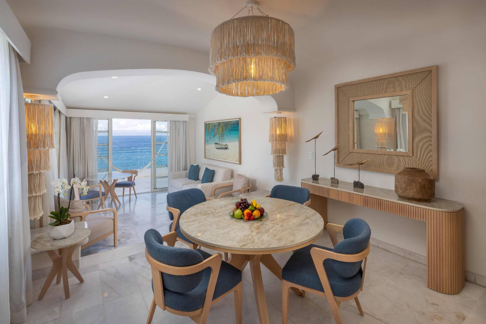 Presidential Suite: living and dining room, hammock on the terrace beyond