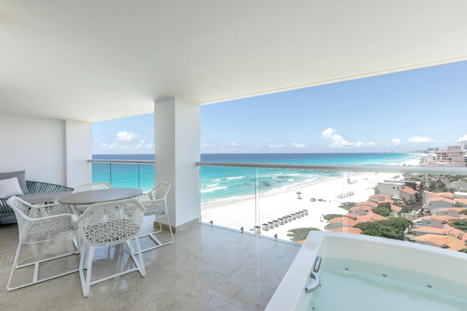 Royale Presidential Suite: corner terrace, outdoor whirlpool, beach below