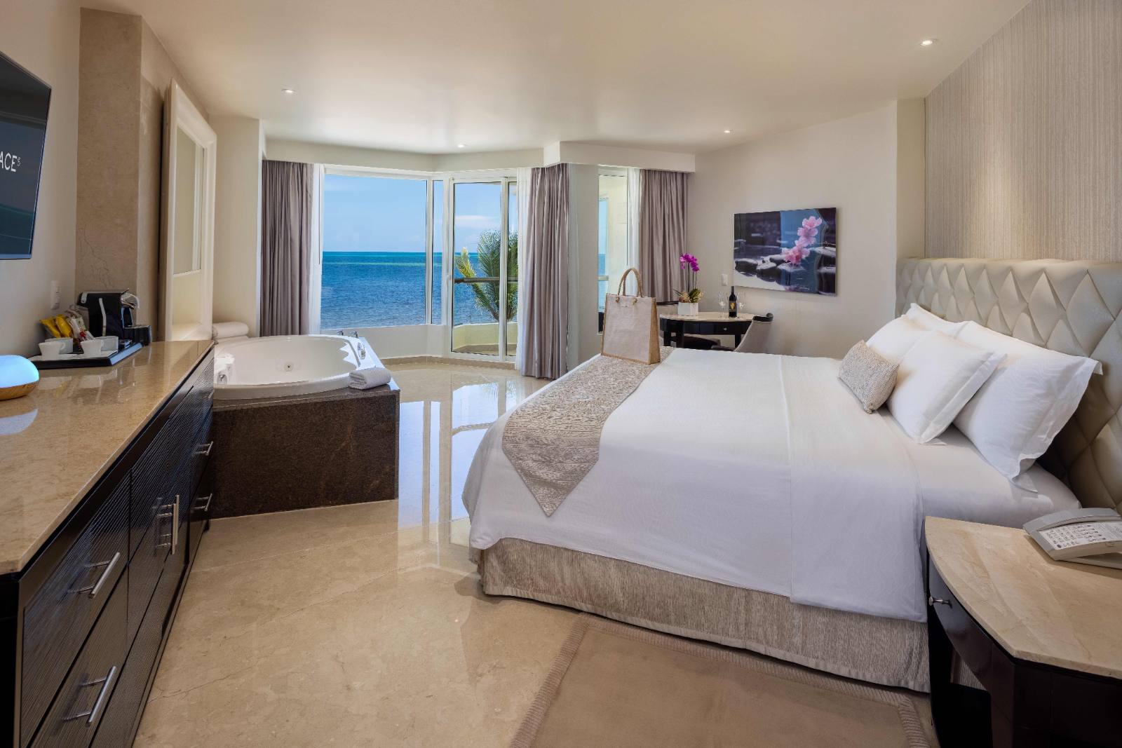 Superior Honeymoon Suite: king bed, whirlpool, open water through the window