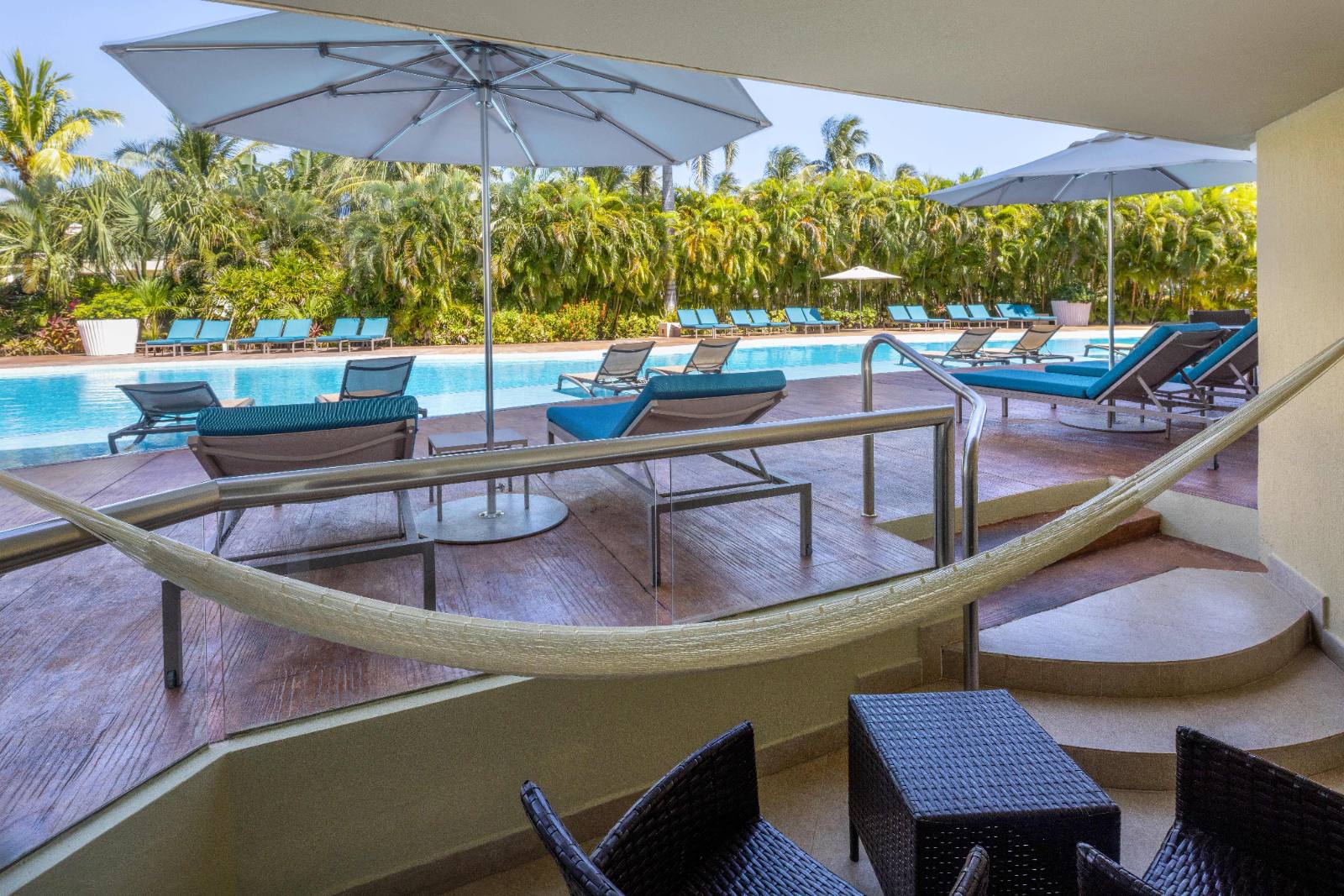 Swim-Up Suite terrace: hammock, then straight into the pool from your own step