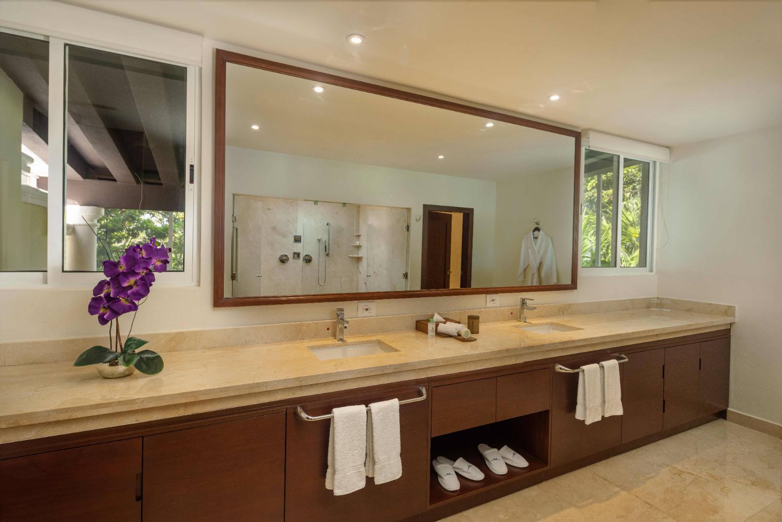 One of the villa baths: double vanity, separate tub and shower
