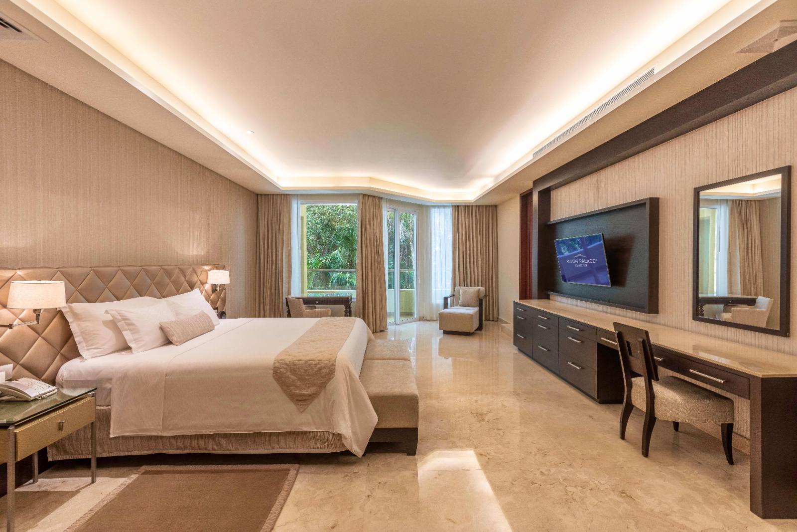 Master bedroom: king bed, desk, and doors onto the fairway side
