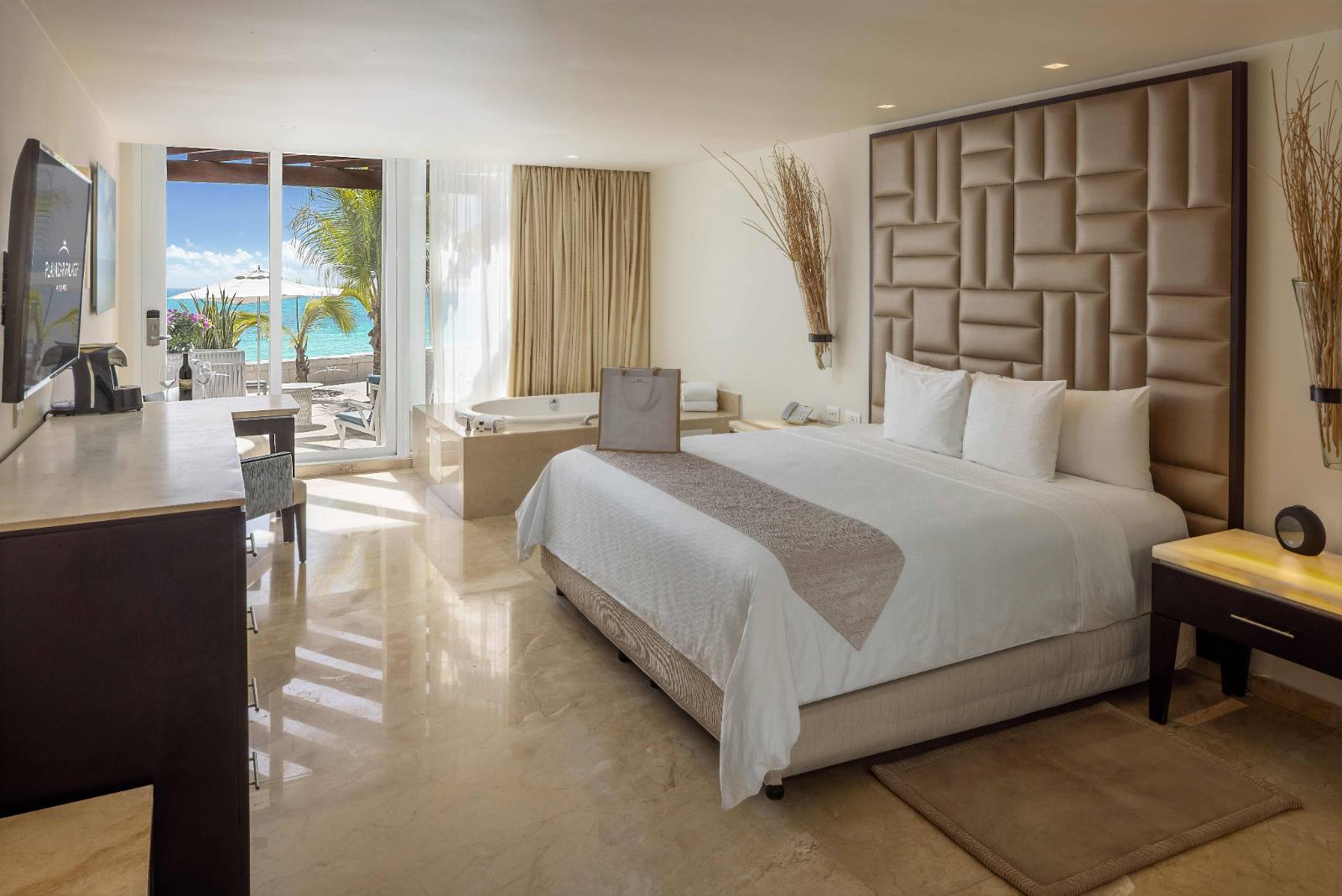 Walkout Suite: king bed, whirlpool, and a terrace onto the pool deck