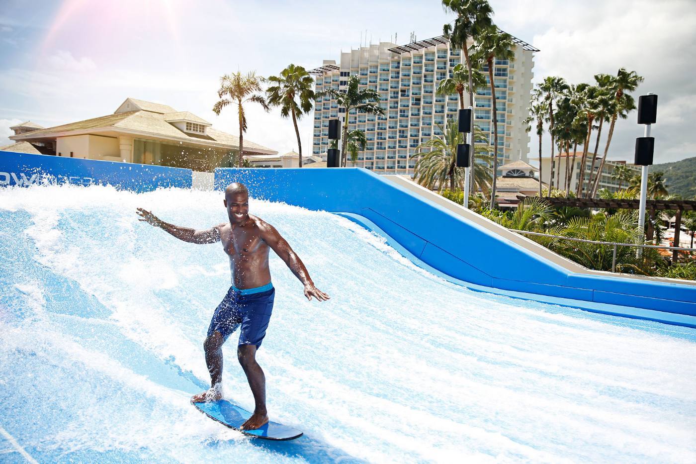 Guest on the FlowRider surf simulator